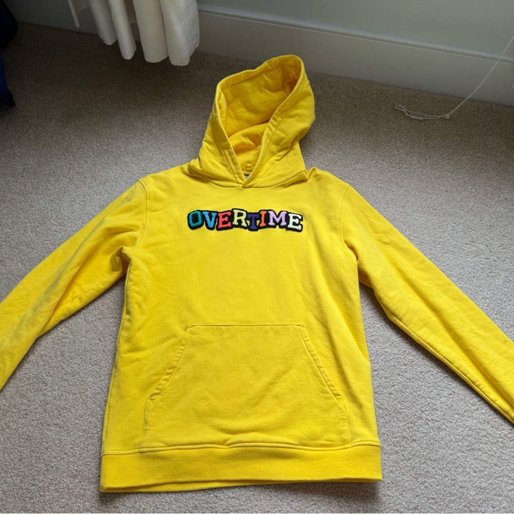 Bright yellow youth XL overtime patched hooded sweatshirt. Great condition!